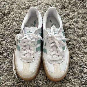 Adidas Samba sneakers in Cloud white, wonder blue, and off white